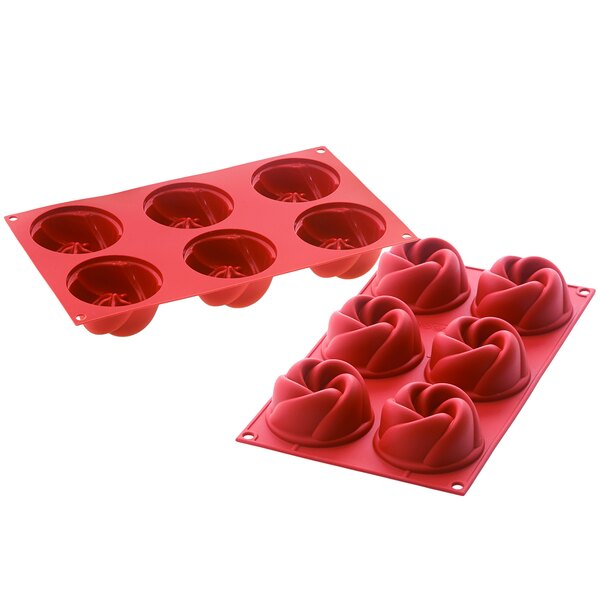 A red silicone mold with six rose-shaped cavities.