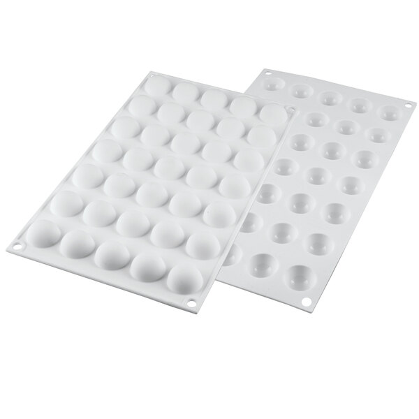A white Silikomart silicone baking mold tray with 35 small dome-shaped cavities.