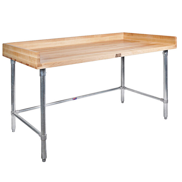 A wooden table with metal legs.