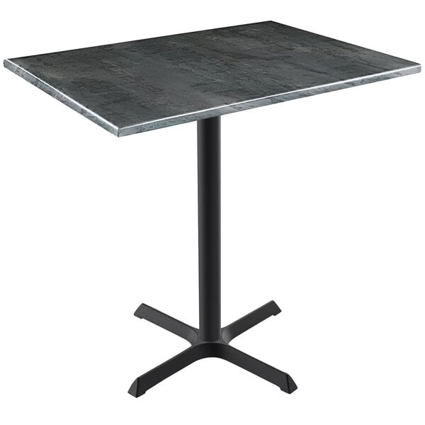 A Holland Bar Stool black steel wood laminate bar height table with a square top on a metal cross base.