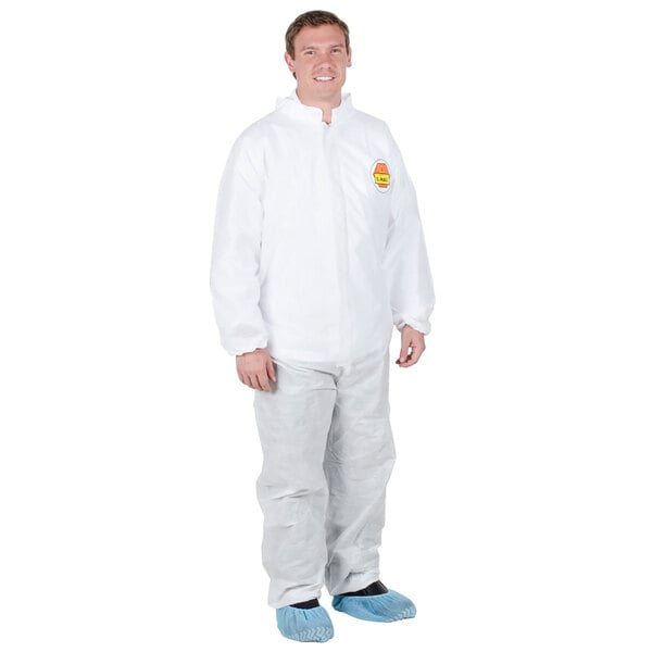 A man wearing a white Cordova Premium polypropylene coverall suit.