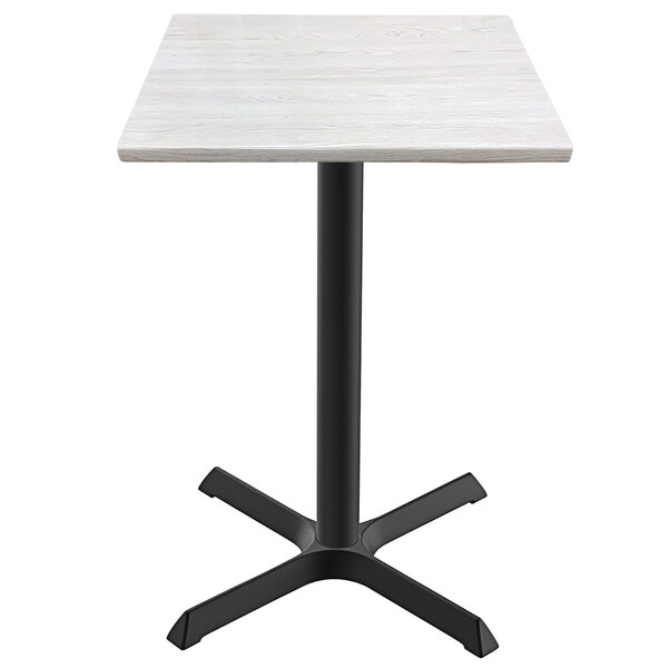 A white square Holland Bar Stool EnduroTop table with a black cross base.