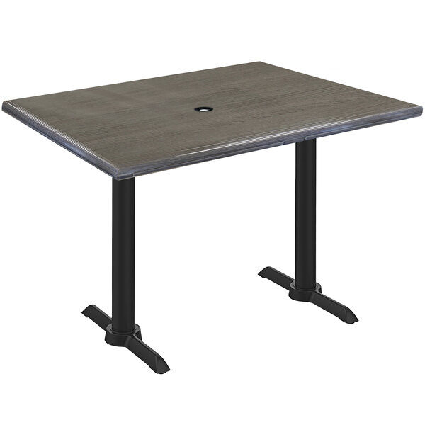 A Holland Bar Stool EnduroTop rectangular table with a black base and a charcoal wood laminate top.