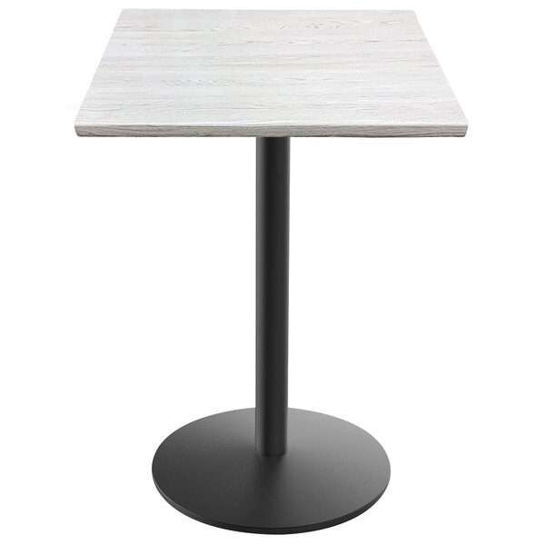 A white square Holland Bar EnduroTop table with a round black base.
