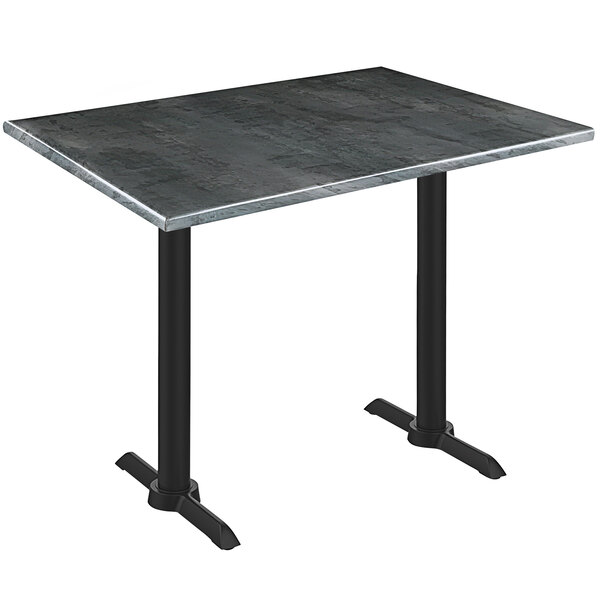 A Holland Bar Stool black steel wood laminate table with black legs.