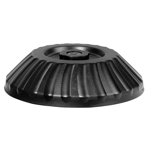 A black plastic round dome cover with a circular design.