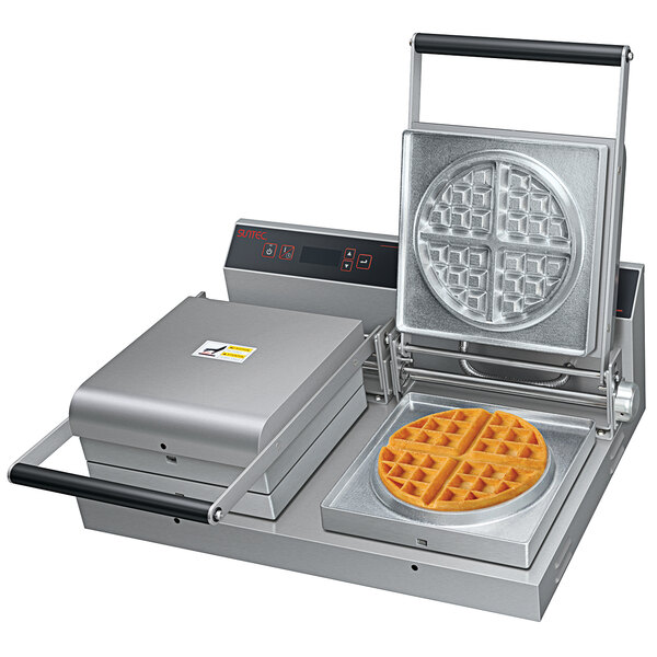 A Hatco commercial waffle maker with a Belgian waffle iron on it.