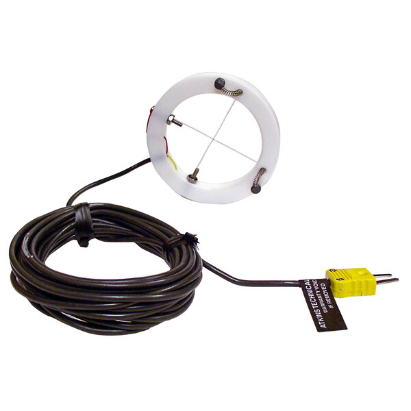 A white circular surface probe with a black and yellow cable.