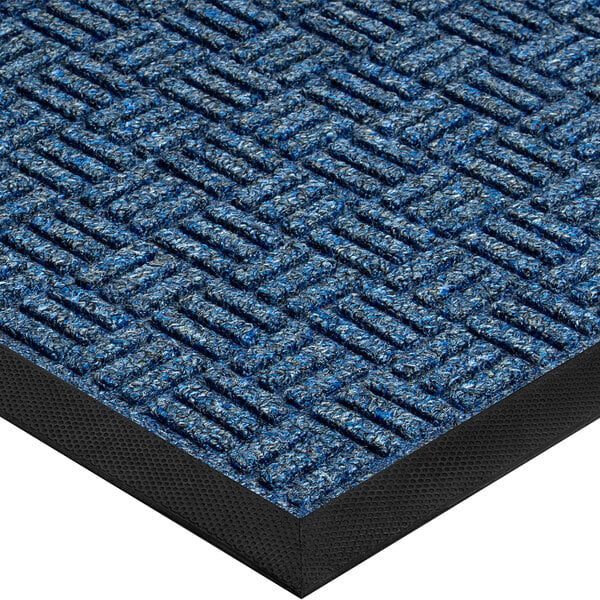A close up of a navy blue Lavex parquet entrance mat with a black border.