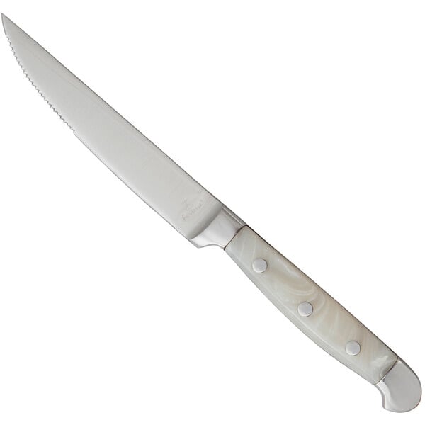 A Fortessa steak knife with a pearl grey handle.
