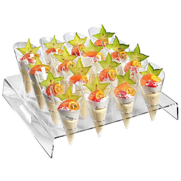 A Solia square buffet display tray with large cones filled with desserts and fruit.