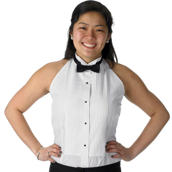 A woman wearing a white Henry Segal tuxedo shirt with a bow tie and wing tip collar.