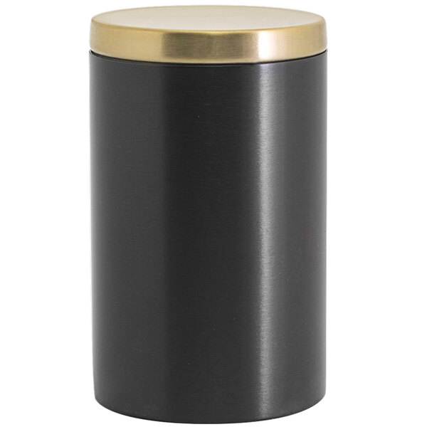A black stainless steel Room360 jar with a matte brass lid.