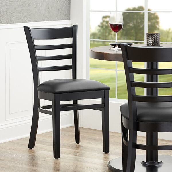 Lancaster Table & Seating Black Finish Wooden Ladder Back Chair with 2 1/2" Black Padded Seat