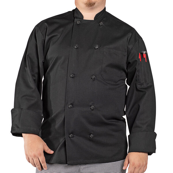 A man wearing a black Uncommon Chef long sleeve chef coat with a knot button closure.