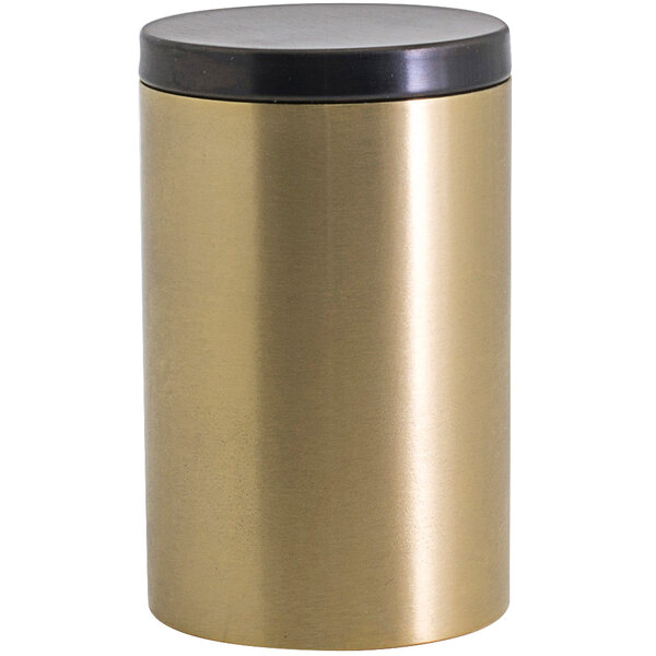 A round matte brass stainless steel jar with a matte black lid.