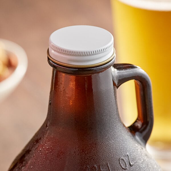 A close-up of the metal lid on an Acopa beer growler.