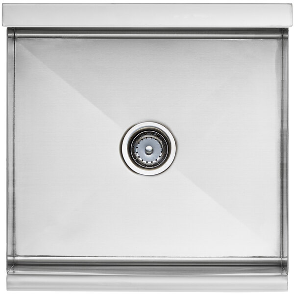A Regency stainless steel utility sink with a drain in front of it.