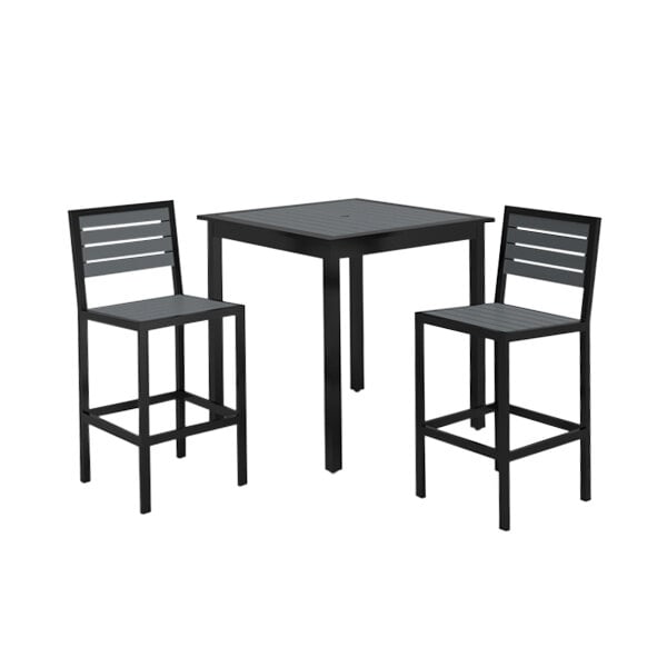 A Wabash Valley Green Valley bar height table with a PolyTuf plastic slat top, surrounded by black chairs with a black umbrella on top.