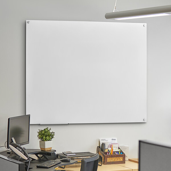 A Dynamic by 360 Office Furniture wall-mounted frosted glass white board.