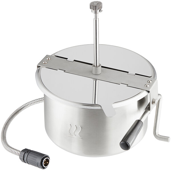 A silver stainless steel Carnival King kettle with a handle.