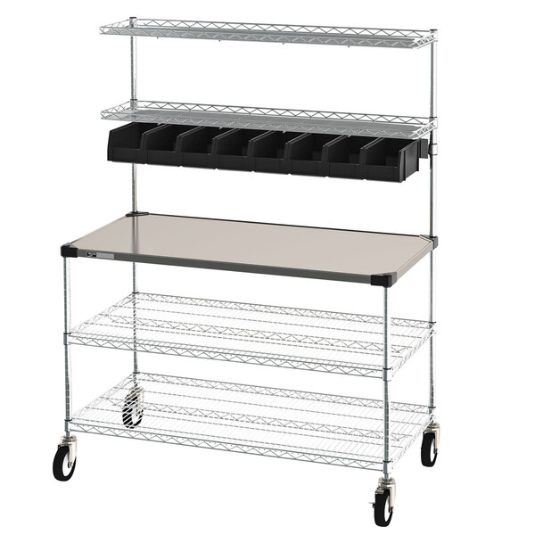 A metal Metro Drive-Thru Order Staging Prep Cart with wire shelving and wheels.