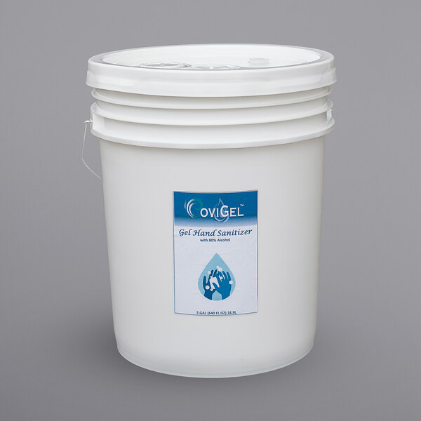 A white Covi Clean 5 gallon pail with a label.