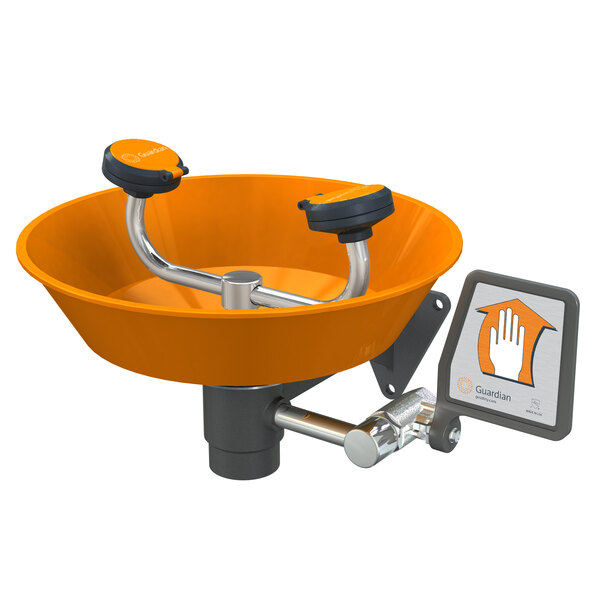 A Guardian Equipment wall mounted eye wash station with an orange ABS plastic bowl.