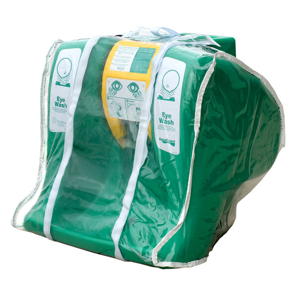 A green plastic bag with a white label that says "Guardian G1540CVR Clear Vinyl Cover"