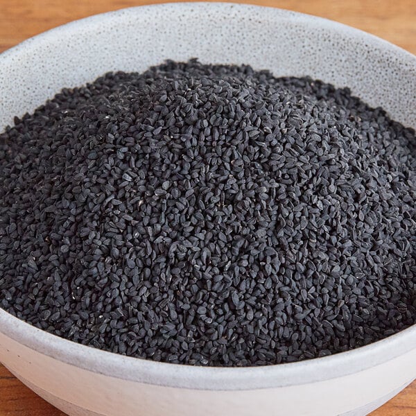 A bowl of Regal black caraway seeds.