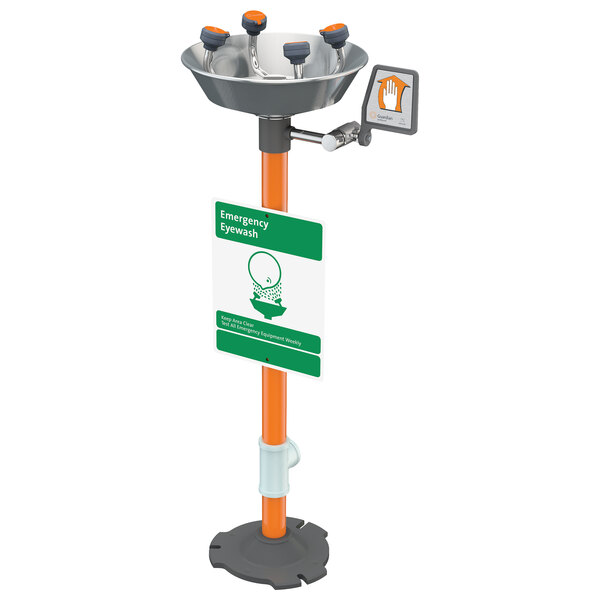 A Guardian Equipment WideArea Pedestal Mounted Eye and Face Wash Station with a white bowl and orange accents on a metal and plastic stand.