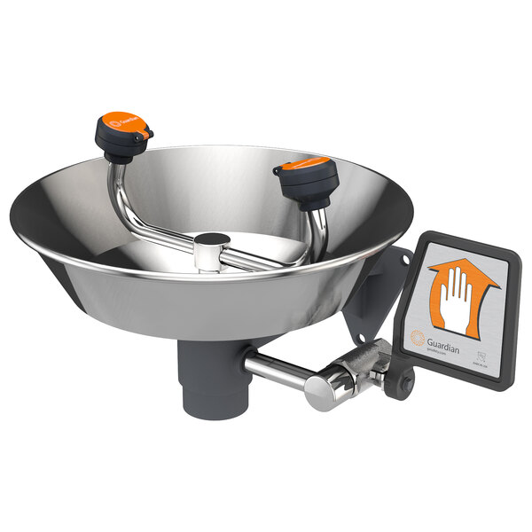 A Guardian Equipment wall mounted eyewash station with a stainless steel bowl and orange and black handles.