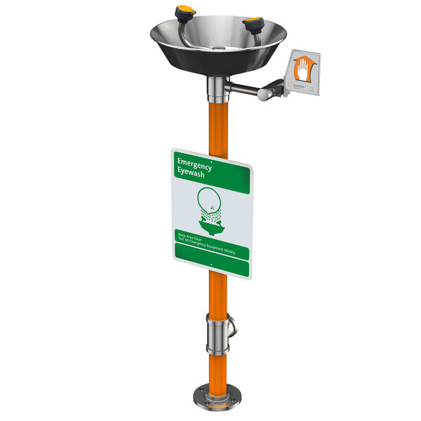 A Guardian Equipment stainless steel pedestal mounted eye wash station with a bowl and sign.