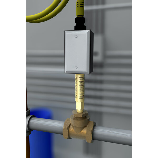 A Guardian Equipment flow switch for safety stations attached to a water pipe.