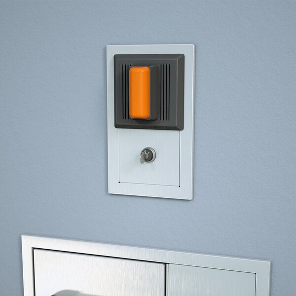 A wall mounted combination strobe light and alarm horn with a silencing switch.