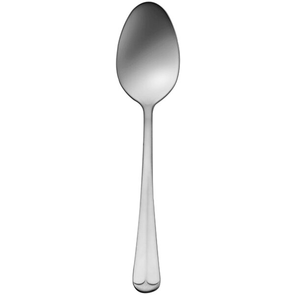 A Delco Old English stainless steel tablespoon with a silver handle.