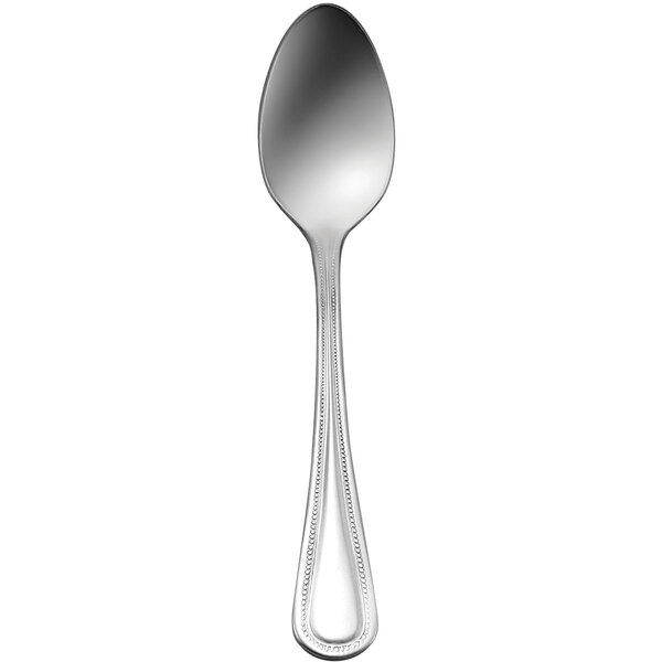 A Delco Prima stainless steel dinner spoon with a white background.