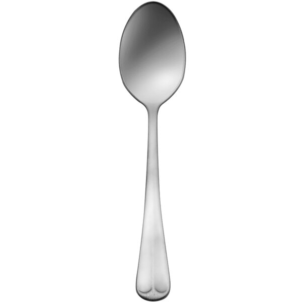 A Delco Old English stainless steel teaspoon with a handle.