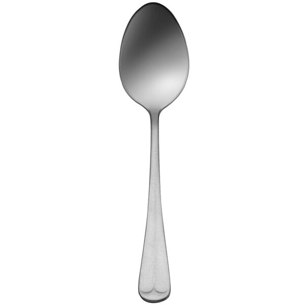 A Delco Old English stainless steel heavy weight dinner spoon with a handle on a white background.