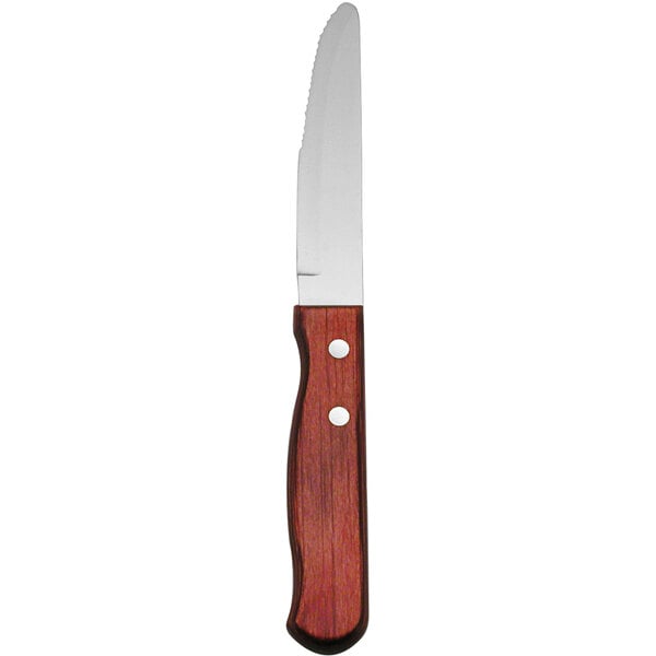 A Delco Montana stainless steel steak knife with a wood handle.