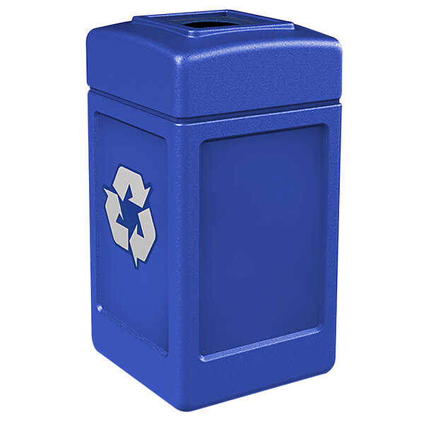 A blue Commercial Zone recycling bin with a white recycle symbol.