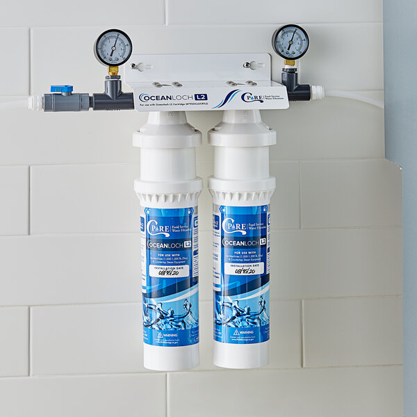 A C Pure water filtration system with two Oceanloch-L2 filters on a wall.