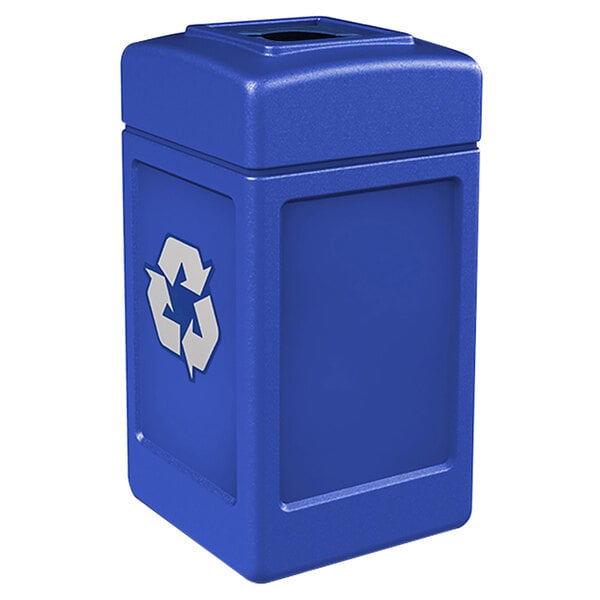 A blue Commercial Zone recycling bin with a white mixed recycling slot and white recycle symbol.
