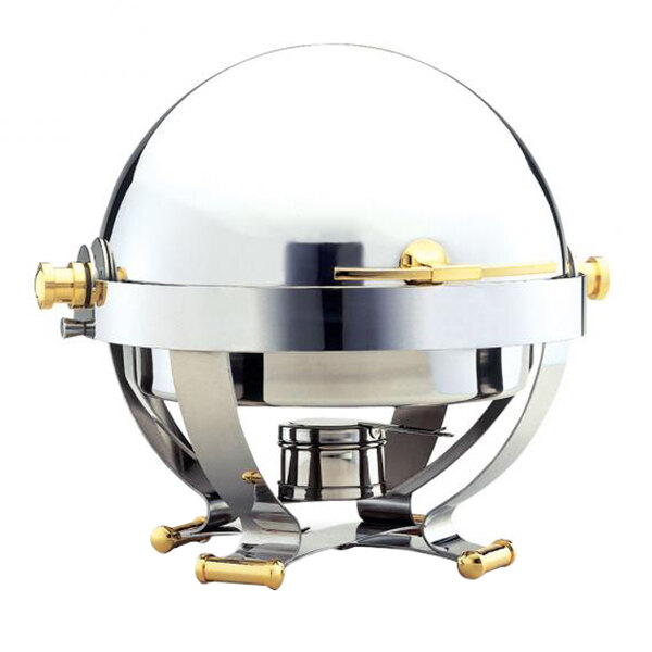 A silver and gold round Walco Satellite chafer on a counter.
