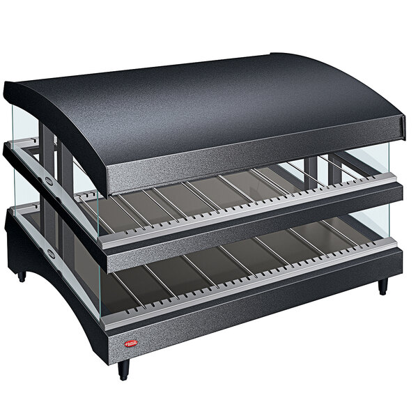 A black Hatco countertop display warmer with two heated glass shelves.