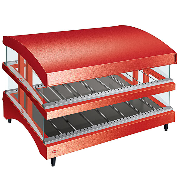 A red Hatco countertop food warmer with glass shelves.