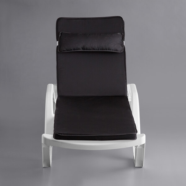 Lancaster Table & Seating White Stacking Adjustable Resin Chaise with Black Cushion and Pillow