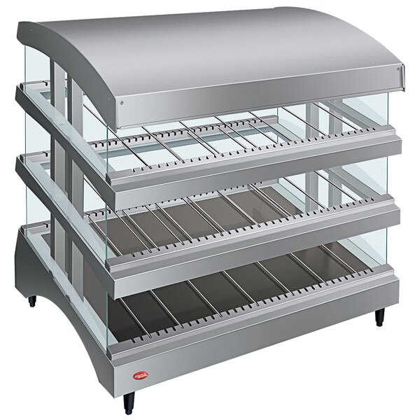 A Hatco countertop display warmer with three heated glass shelves.