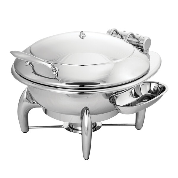 A silver stainless steel Walco Idol round chafer with a metal lid on a table.