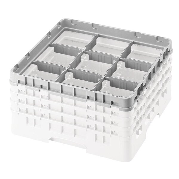 A white plastic Cambro extender with nine compartments.